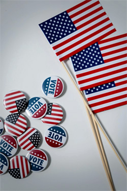 images of small buttons that show American flag and "Vote" and American flags