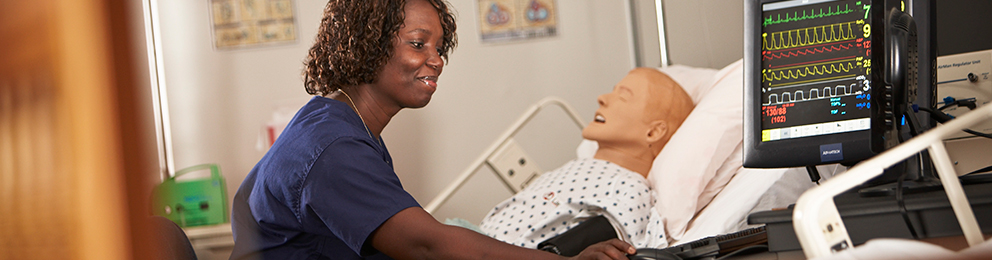 Nursing student working with telemetry in a simulation lab