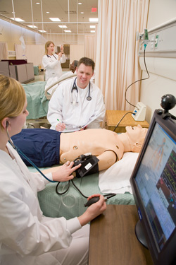 Students working in a Southeast Nursing sim lab