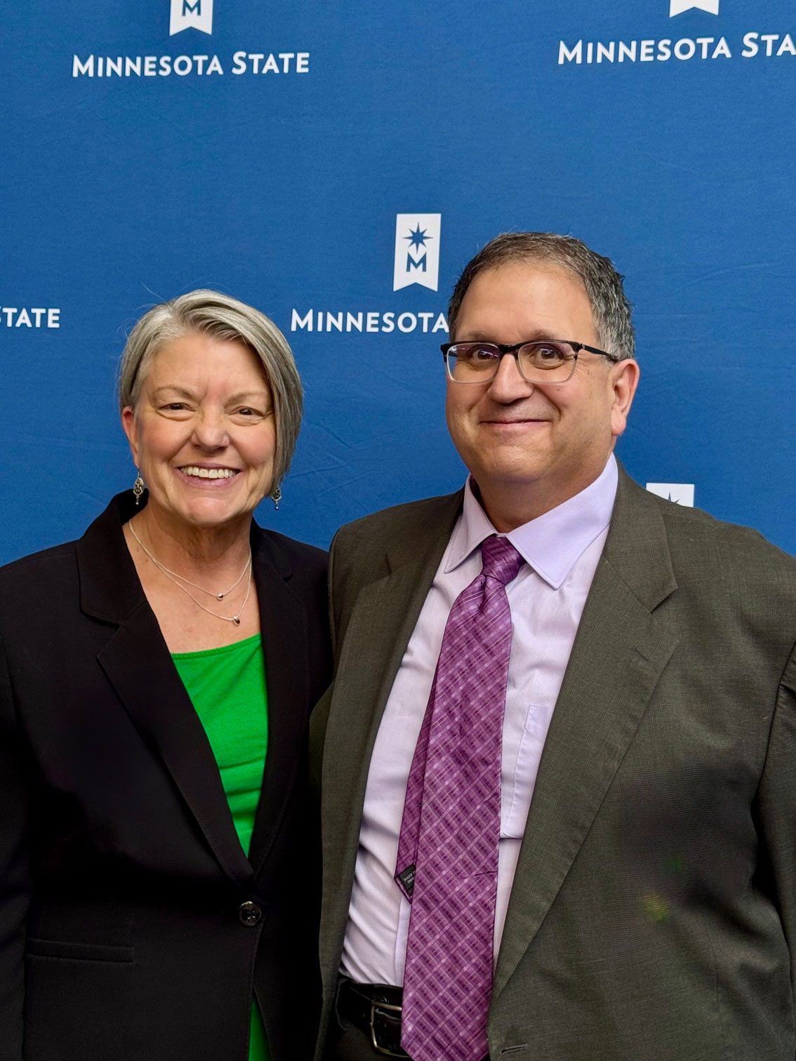 Southeast President Marsha Danielson poses with Band Instrument Repair instructor John Huth, as he was honored as the Educator of the Year.
