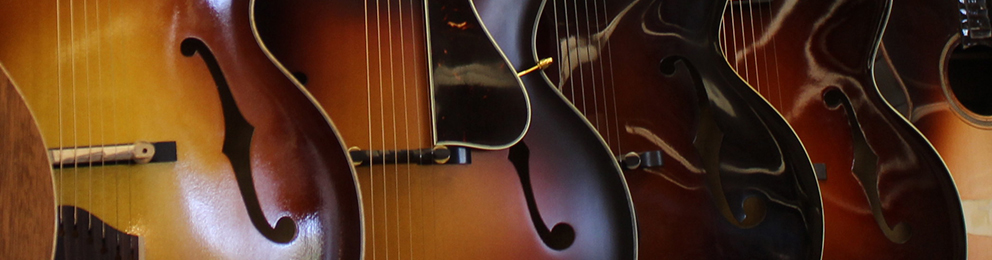 Lineup of archtop guitars