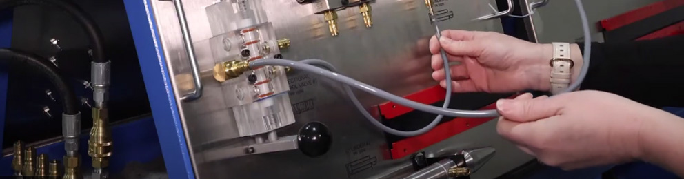 Hands working on a mechtronics controller